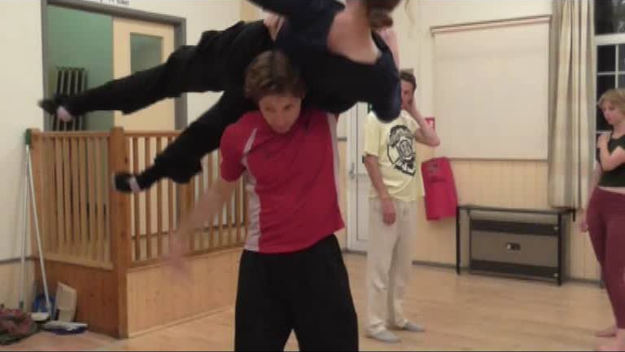 Jane Connelly (flying) and Ross Atkins (base/underdancer perform a lift